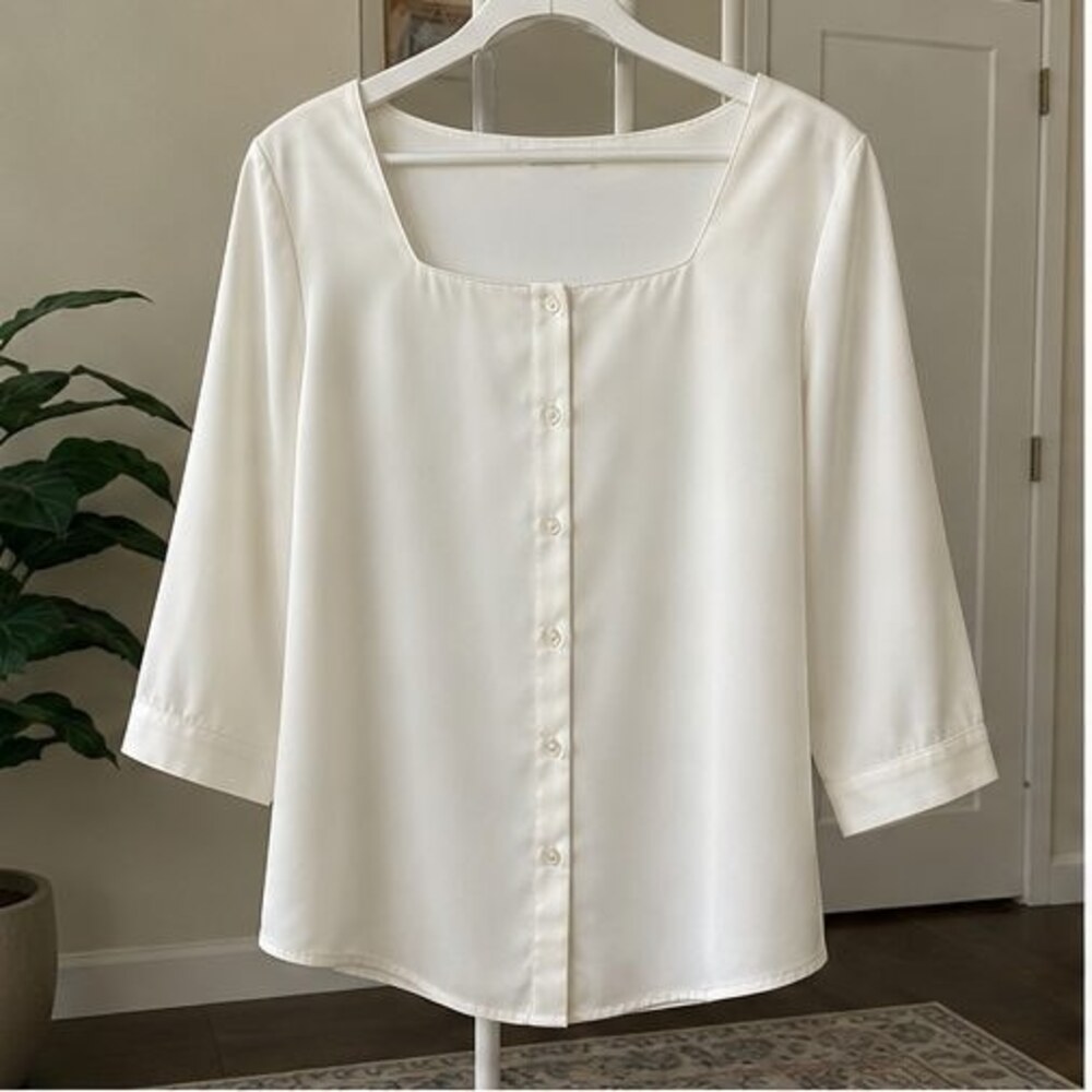 Ivory Peplum Top